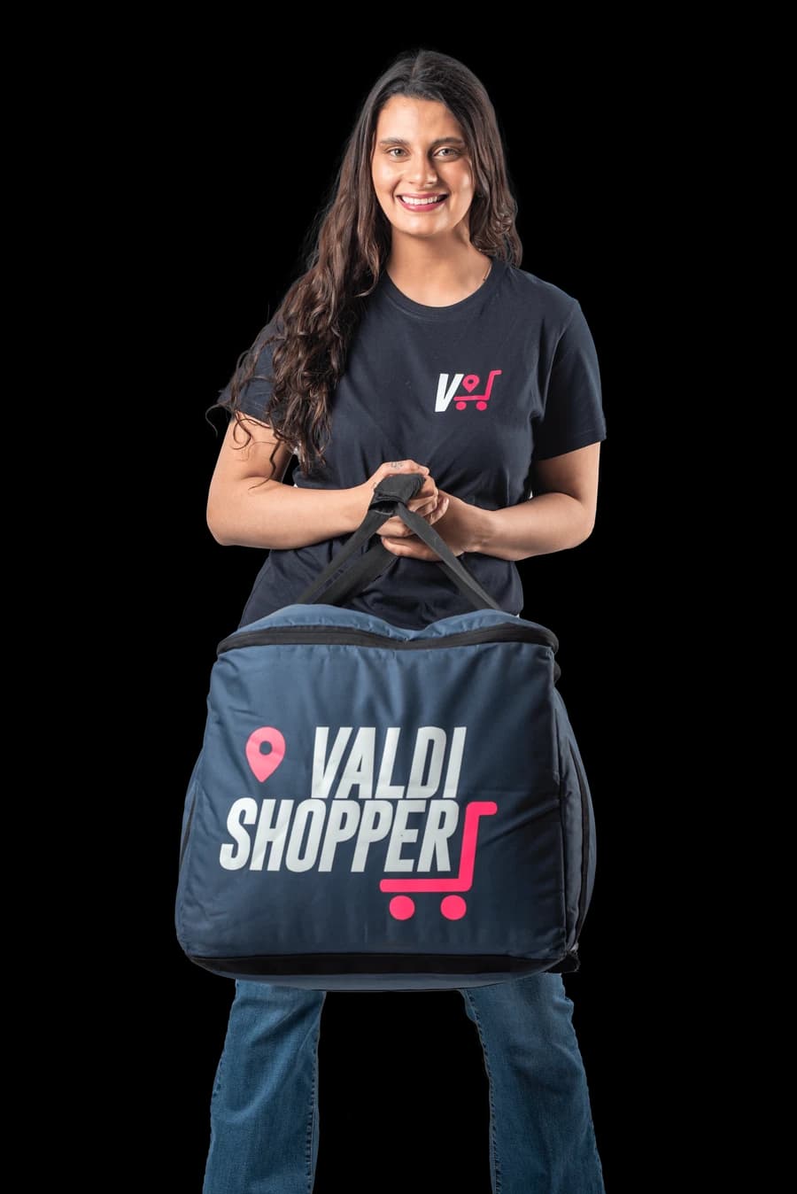 Valdishopper sonriendo con su bolso de reparto